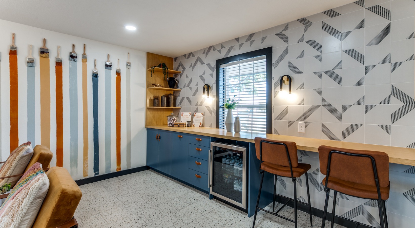a kitchen with a bar and a wall with skis at The 8500 Harwood